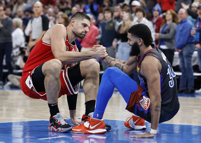 Chicago Bulls center Nikola Vucevic (9) and Oklahoma City Thunder forward Kenrich Williams (34)